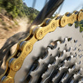 KMC X12 12-fach Fahrradkette Gold, 126 Glieder, 268g Leichtgewicht. Für präzise Schaltperformance an Rennrad & MTB.