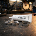 DT Swiss Ratchet System 24 Zähne Upgrade Kit: Spezialfett, Ratchet-Ringe, Feder für präzise Naben-Wartung.