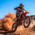 LS2 Charger Pro Crossbrille rot an Motocross-Fahrer beim Sprung, 100% UVA- & UVB-Schutz im Gelände.