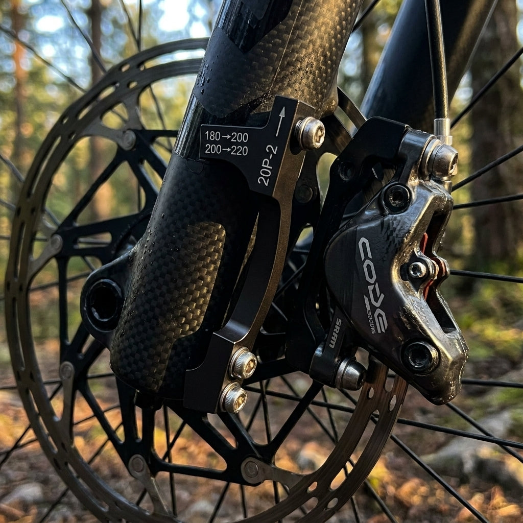 SRAM Scheibenbremsadapter Post Mount 20P-2 (200/220mm) mit Titan Schrauben. Upgrade für maximale Bremsleistung am Mountainbike.