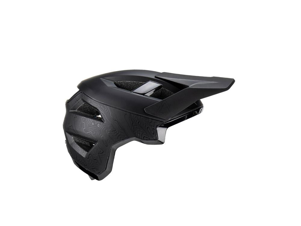 Schwarzer Leatt MTB All Mountain 3.0 Stealth Fahrradhelm mit Visier und Topo-Muster.