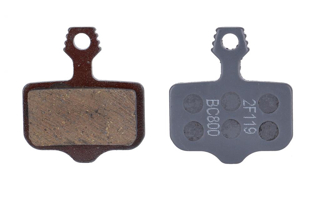 Zwei SRAM Scheibenbremsbeläge organisch/Stahl für Level Elixir DB2 Road Bremsen auf weißem Hintergrund.