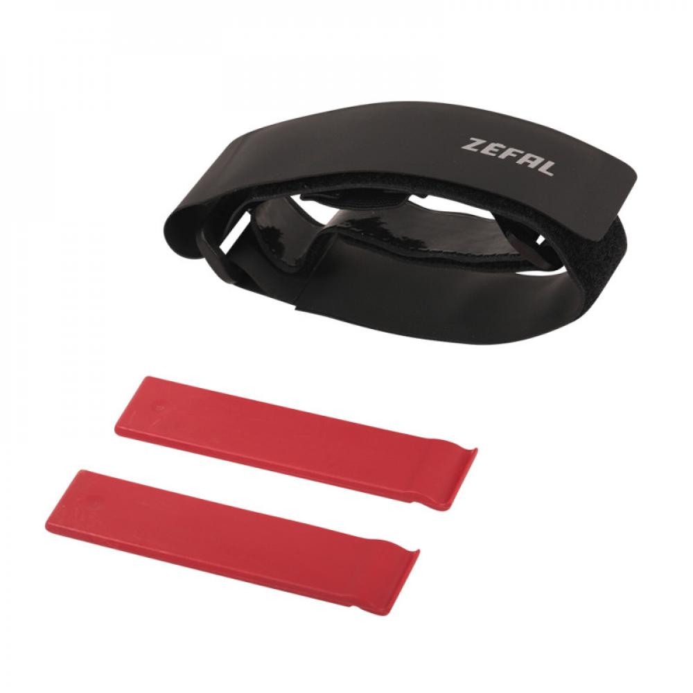 Zéfal Schlauchhalter Tube Strap mit zwei roten Reifenhebern für sichere Befestigung am Fahrradrahmen.