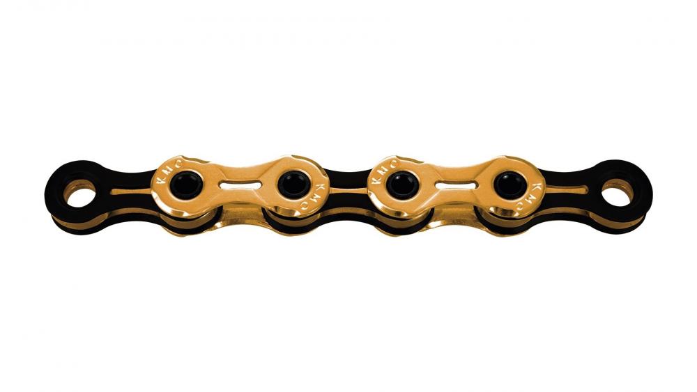 KMC X11SL Ti-N 11-fach Fahrradkette in Gold/Schwarz mit Hohlbolzen und KMC-Logo auf den Gliedern.