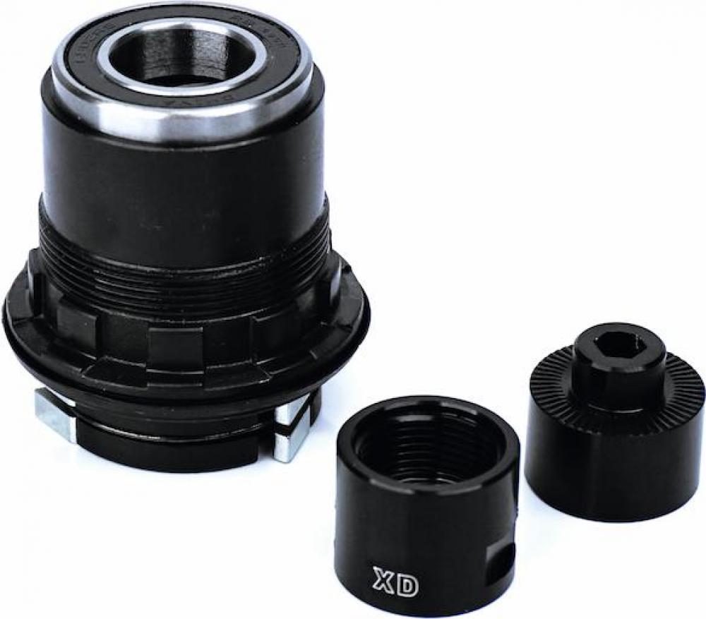 Schwarzes SUNringle Freilauf/Rotor Umrüstkit SRC/SRX mit XD Endkappen zur Naben-Umrüstung.