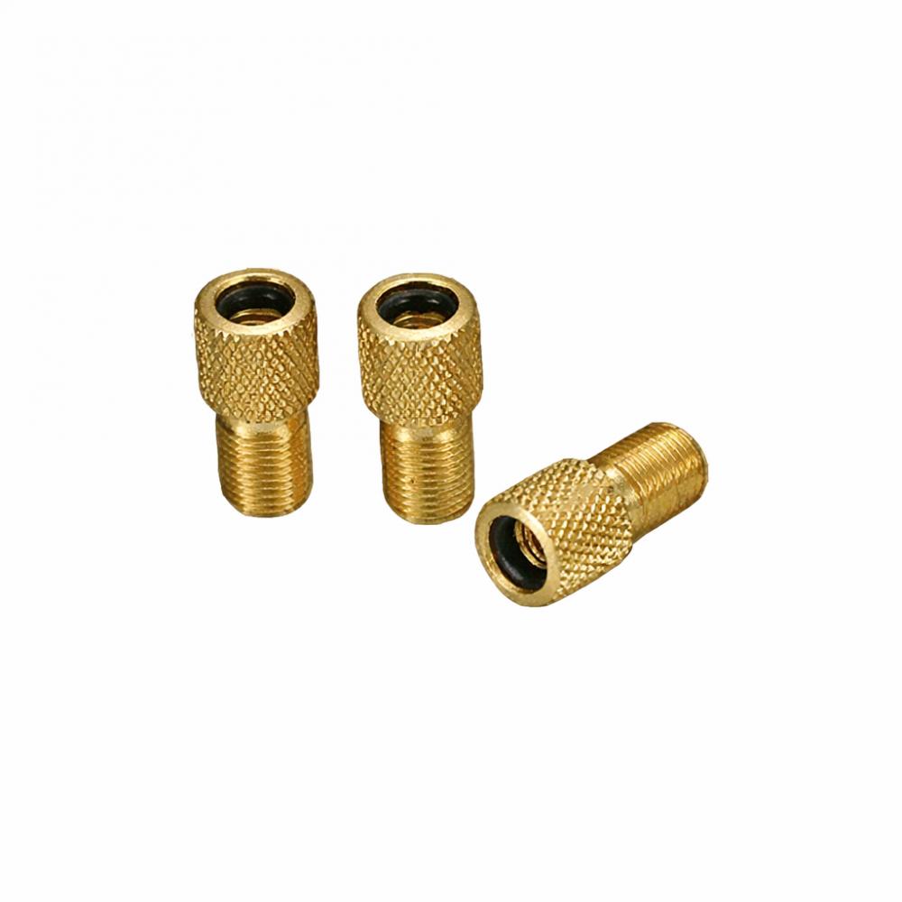 Drei goldene XLC Ventiladapter aus Messing zur Umwandlung von AV auf DV/SV Fahrradventile.