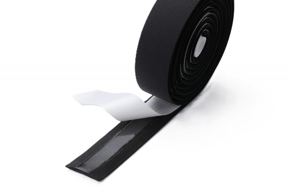 Schwarzes BBB Cycling GravelRibbon Gel 200 Lenkerband für Gravelbikes mit abgezogenem Klebestreifen zur Montage.