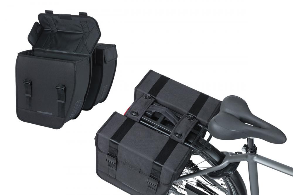 Basil Tour MIK 2.0 Doppeltasche 28L schwarz auf Fahrrad-Gepäckträger mit MIK-Adapterplatte. Wasserabweisend, Reflektoren.