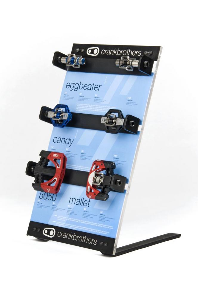 Crankbrothers Pedal Thekenaufsteller präsentiert 6 verschiedene Fahrradpedale: Eggbeater, Candy, 5050, Mallet.