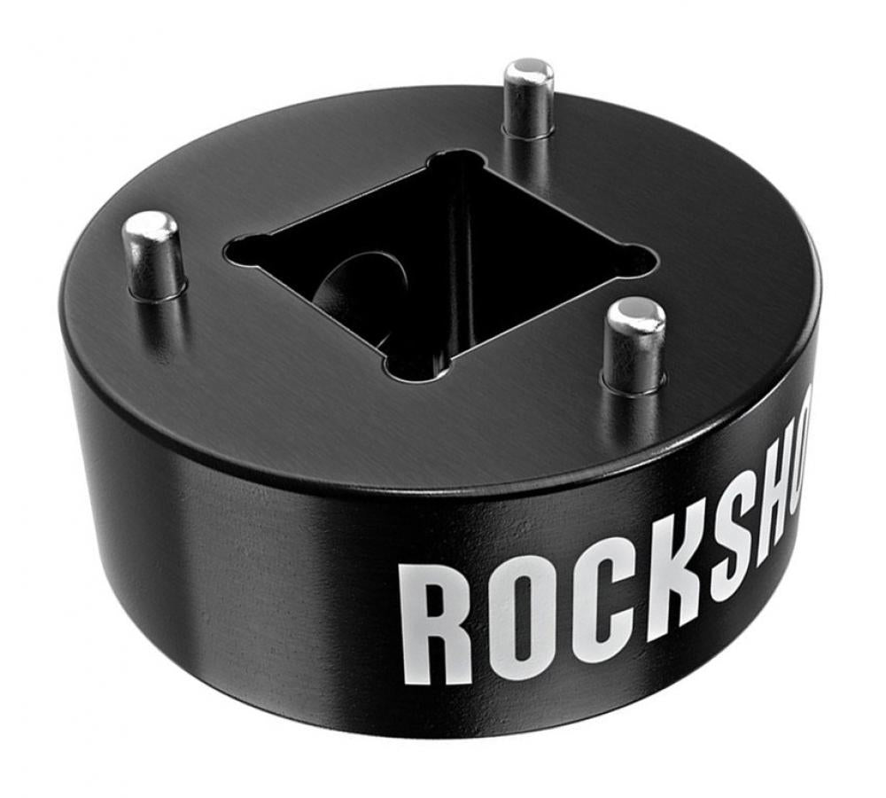 Schwarzes Rockshox Kolbenwerkzeug für Hinterbaudämpfer mit drei Positionierungsstiften und Rockshox Logo.