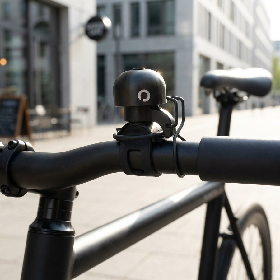 Procraft DIN-Dong Ultimate Fahrradklingel schwarz. Laute, stilvolle Klingel für sicheres Radfahren.