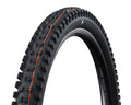 Schwalbe Tacky Chan Mountainbike Reifen 27.5x2.40" schwarz mit orangefarbenen Streifen auf weißem Hintergrund.