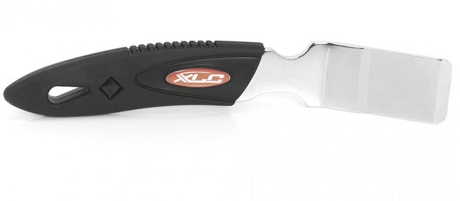 XLC Scheibenbremskolben-Justierhilfe TO-S34 mit schwarzem Griff und flacher, silberner Klinge.
