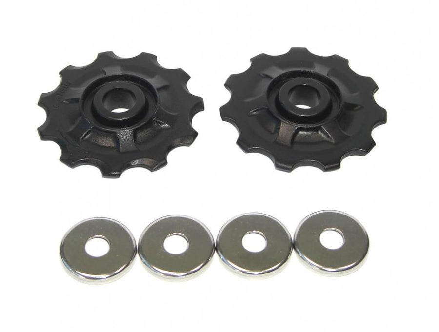 SRAM X.5 10-fach Schaltrollen-Set mit zwei schwarzen Rollen und vier silbernen Unterlegscheiben für Fahrradschaltungen.