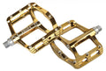 Zwei goldfarbene Xpedo SPRY+ Fahrradpedale XMX24AC, glänzend, 9/16 Zoll.