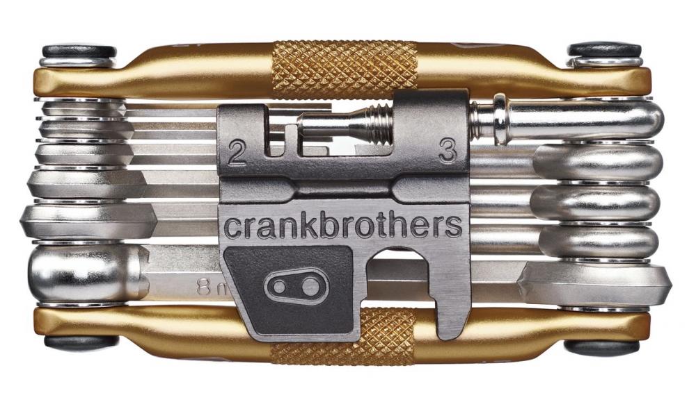 Crankbrothers Multi-17 Fahrrad Multitool gold mit Kettennieter und Sechskantschlüsseln.