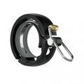 Knog Oi Luxe Fahrradklingel groß 23.8 - 31.8mm mit Kabelführung matt schwarz
