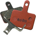 Kool Stop Scheibenbremsbelag D-620 für Fahrrad-Scheibenbremsen, rote und schwarze Beläge mit Feder.