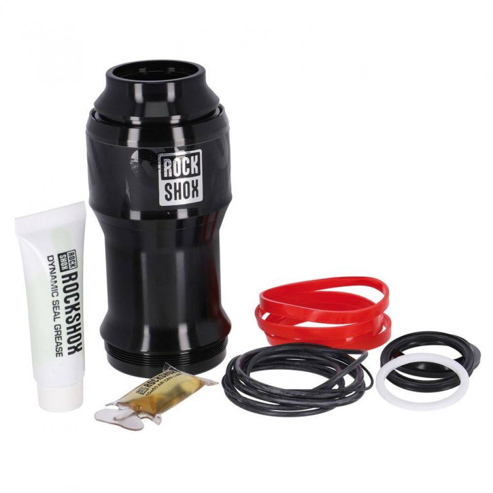 RockShox Air Can Upgrade Kit mit schwarzer Luftkammer, Dichtungen (rot, schwarz, weiß), Schmierfett und Öl.