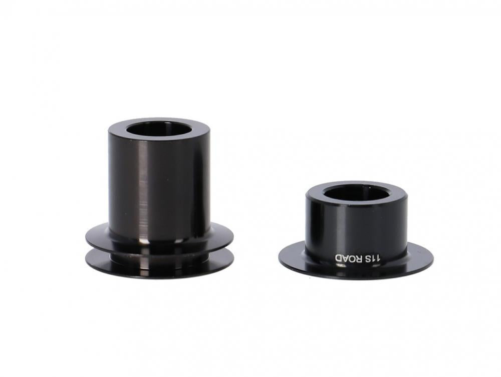 Zwei schwarze DT Swiss Umrüstkit Endkappen für Hinterrad 12mm Steckachse.