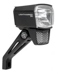 Schwarzes TRELOCK Lighthammer 60 LED E-Bike Frontlicht mit Reflektor für helle und sichere Fahrt.