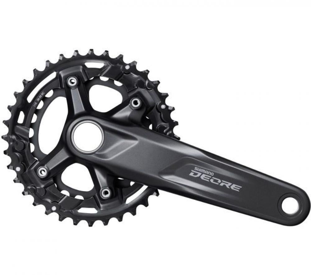 Dunkelgraue SHIMANO DEORE FC-M5100 11-fach MTB Kurbelgarnitur mit 36-26 Zähne Kettenblättern.