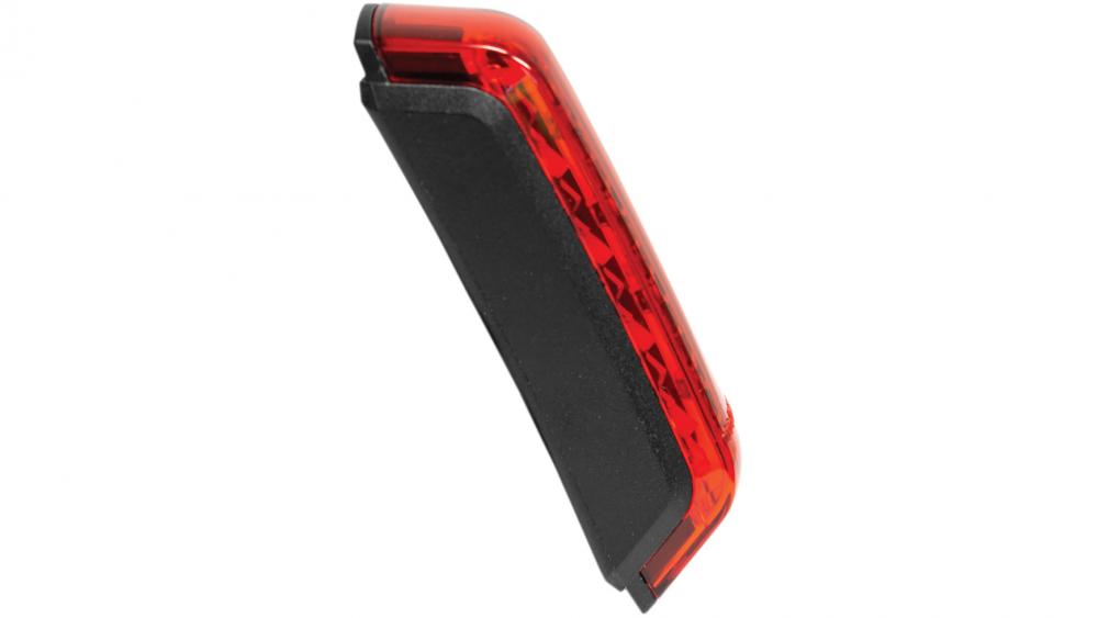 Rotes Trelock LED-Dynamo-Rücklicht LS 415 COB Line Signal mit schwarzem Gehäuse, seitlich dargestellt.