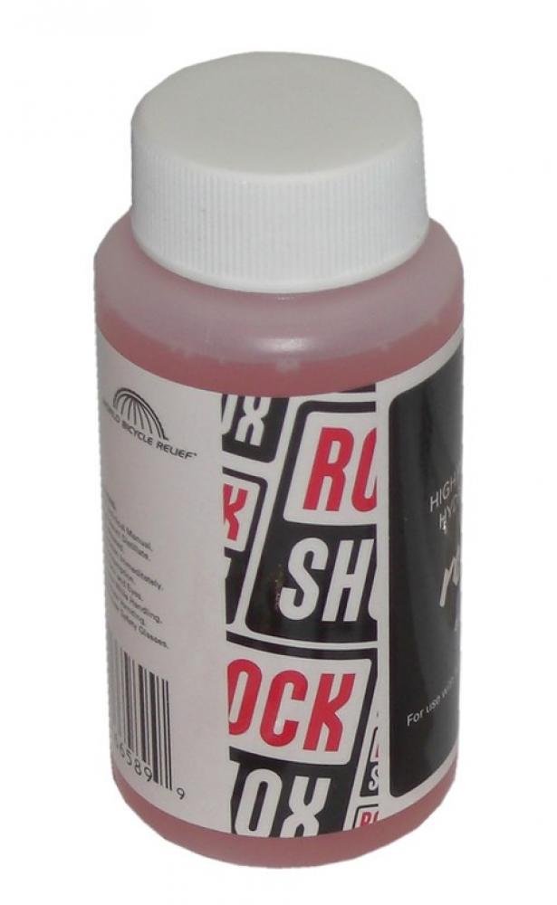 RockShox Hydraulik Fluid Reverb 1 Liter Flasche mit pinker Flüssigkeit für Fahrrad-Fahrwerke.