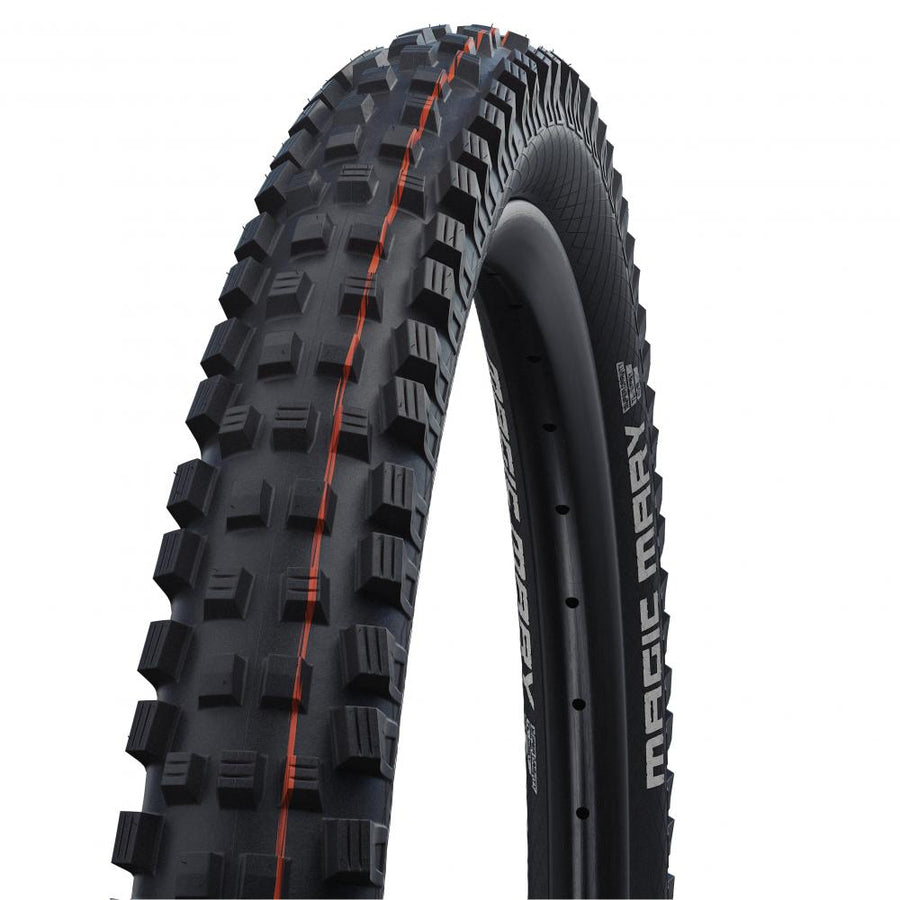 Schwalbe Magic Mary 29x2.40 (62-622) TLE E-50 MTB Downhill Faltreifen mit aggressivem Profil und orangefarbenen Linien.