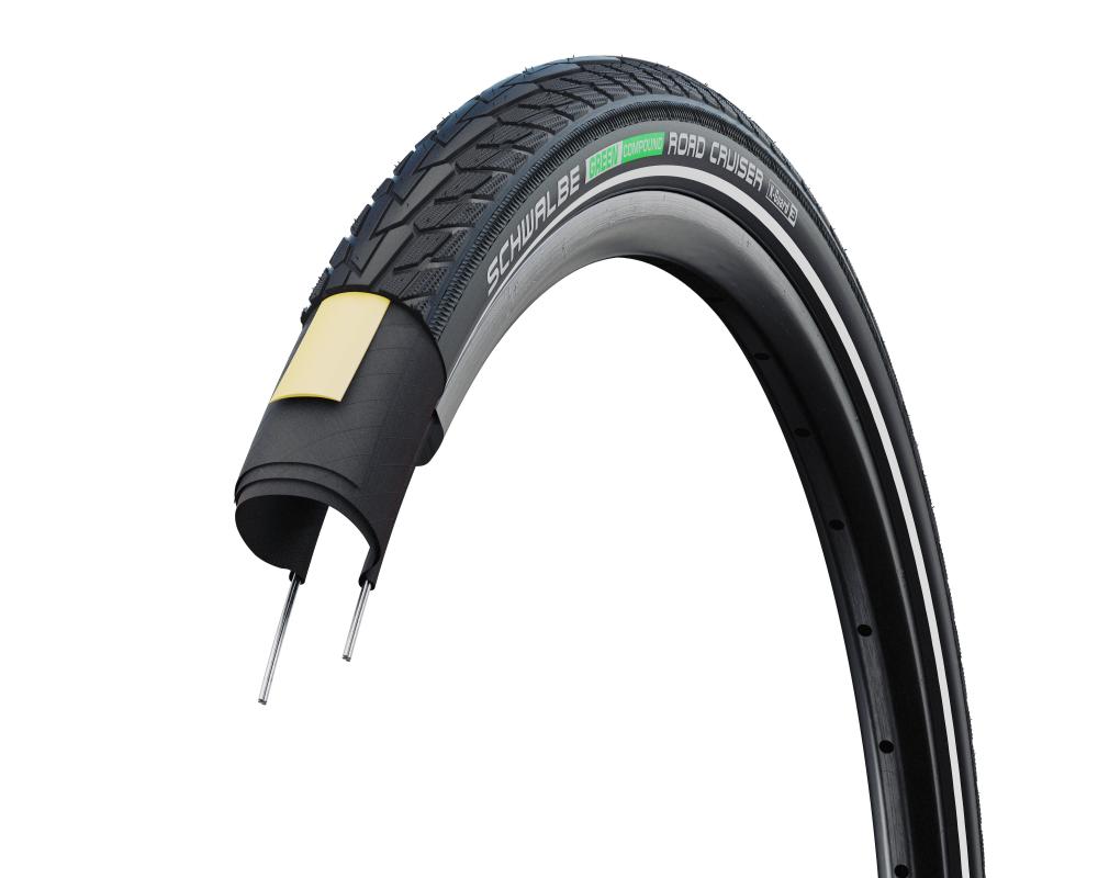 Schwalbe Road Cruiser 27.5x1.65 Reifen Querschnitt mit K-Guard Pannenschutz und Green Compound Lauffläche.