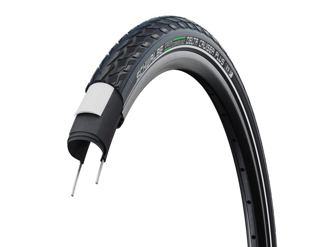 Schwalbe Delta Cruiser Plus E-25 Fahrradreifen schwarz Reflex, Schnittansicht mit Pannenschutz und Draht.
