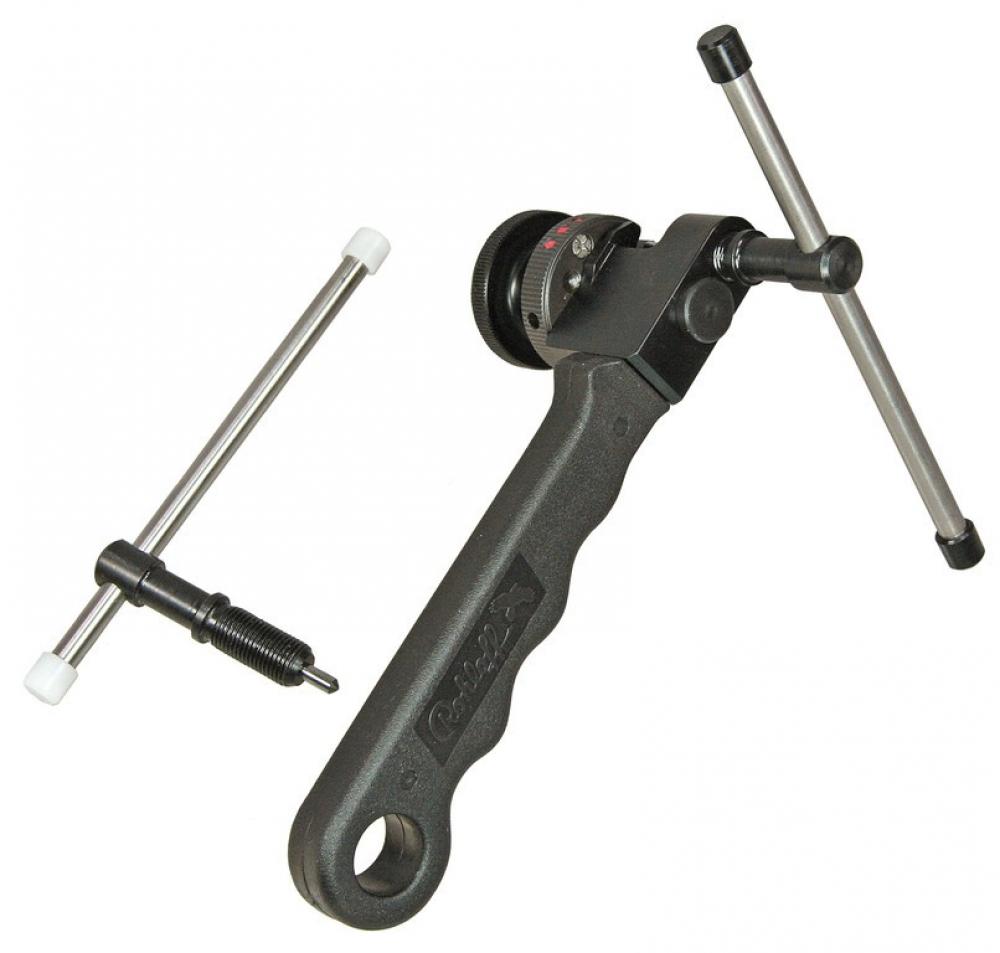 Nietwerkzeug Rohloff Revolver 3, schwarzes Fahrradkettenwerkzeug mit T-Griff und kleinerem Werkzeug.
