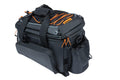 Basil Miles XL Pro Gepäckträgertasche schwarz-orange, wasserdicht, 9-36 Liter, mit ausklappbaren Seitentaschen.