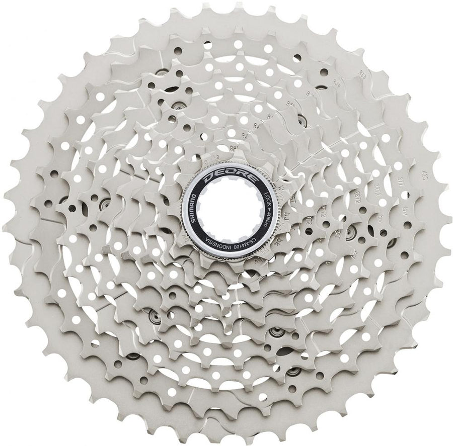Silberne SHIMANO DEORE CS-M4100 10-fach 11-42Z MTB Kassette für robuste Schaltperformance.