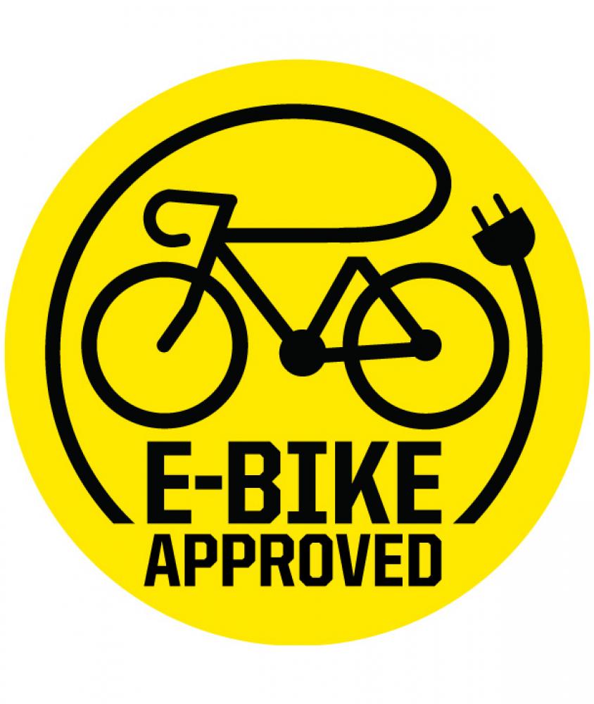 E-Bike APPROVED Logo: Gelber Kreis mit schwarzem Fahrrad, Ladekabel und Stecker. Symbol für E-Bike-Freigabe.