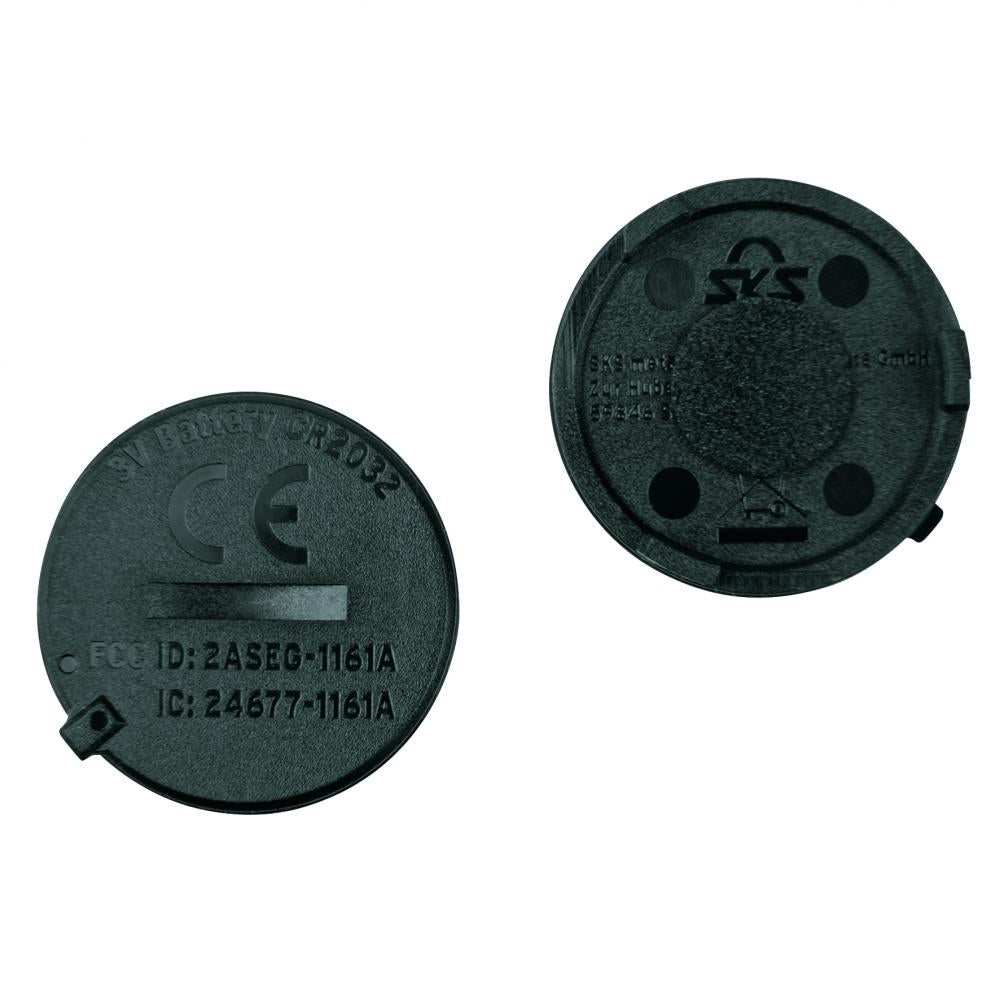Zwei schwarze SKS AIRSPY Ersatzdeckel für Reifendrucksensoren, passend für Ventile, schützt vor Staub.