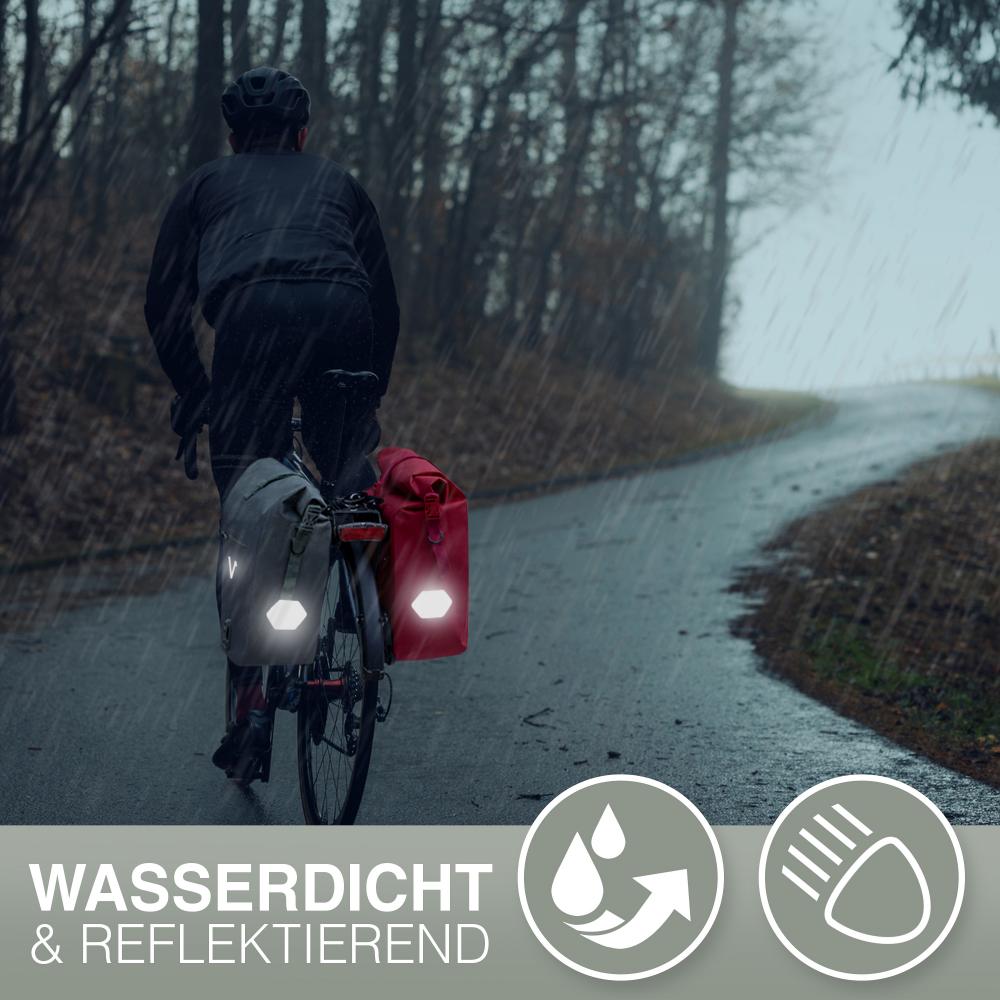 Valkental Gepäckträgertasche ValkOcean Seegras am Fahrrad: wasserdicht und reflektierend bei Regen.