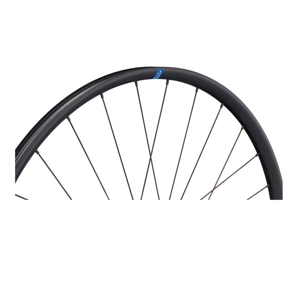 Ritchey WCS Zeta GX 27.5 Zoll Tubeless Ready Laufrad schwarz mit Speichen und blauem Logo auf der Felge.